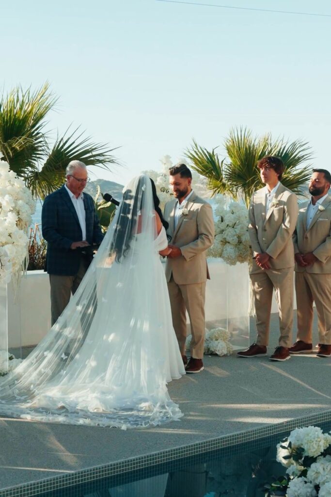 Caitlin and Damon at their wedding ceremony on Paros, Greece, filmed by Konstantinos Liopetas